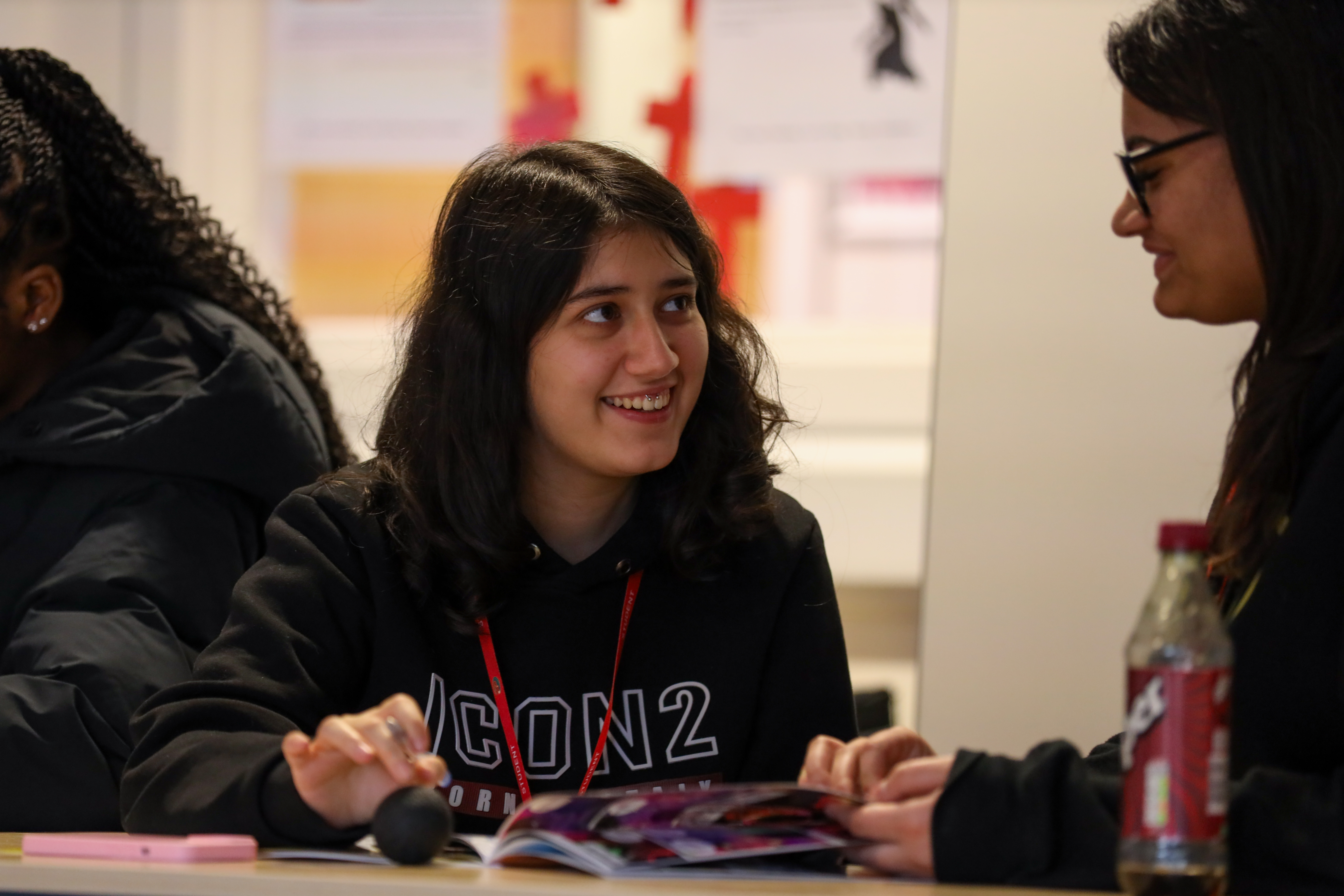 Young people working together during a financial education session