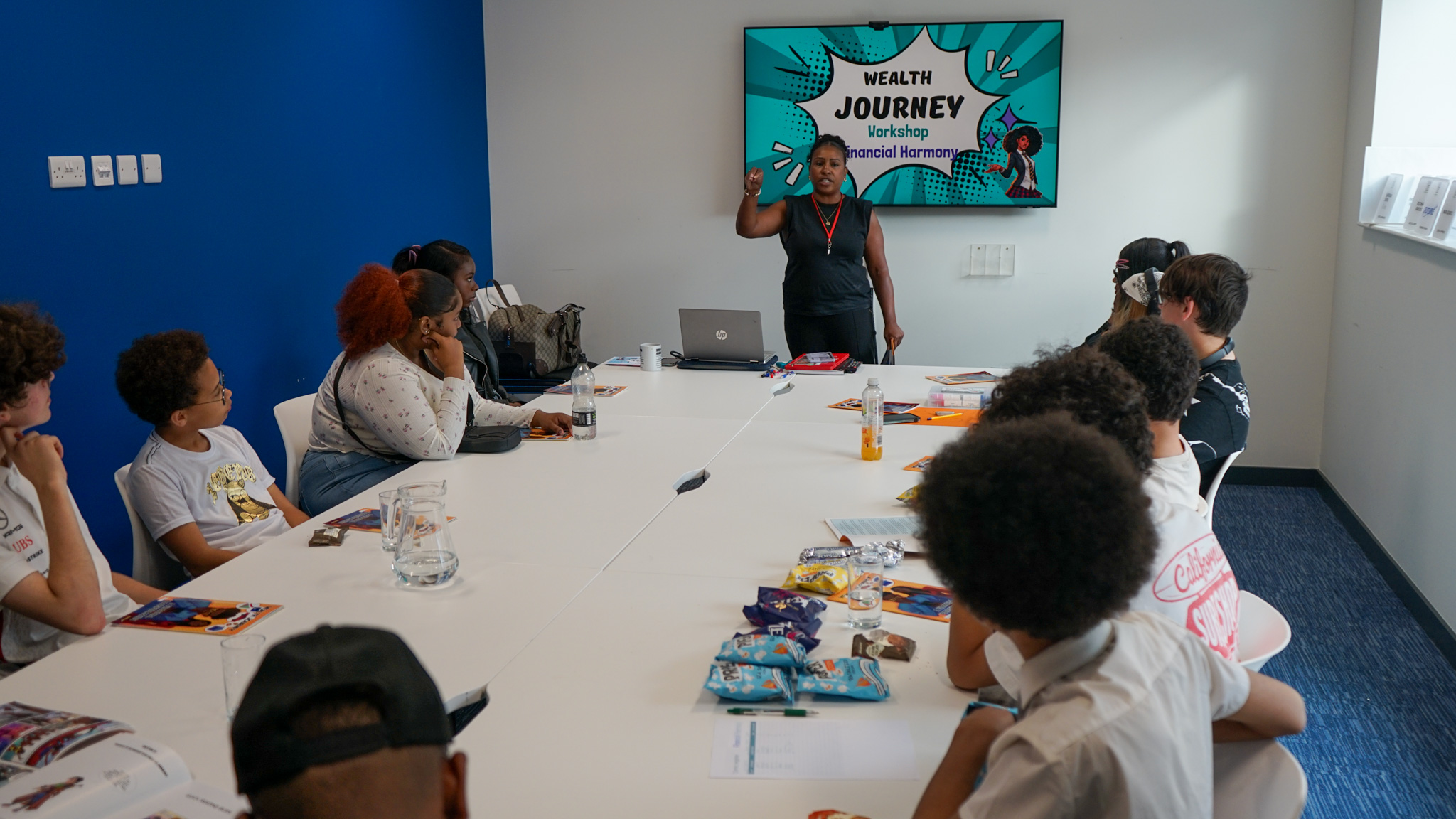 Young people learning about saving and investing